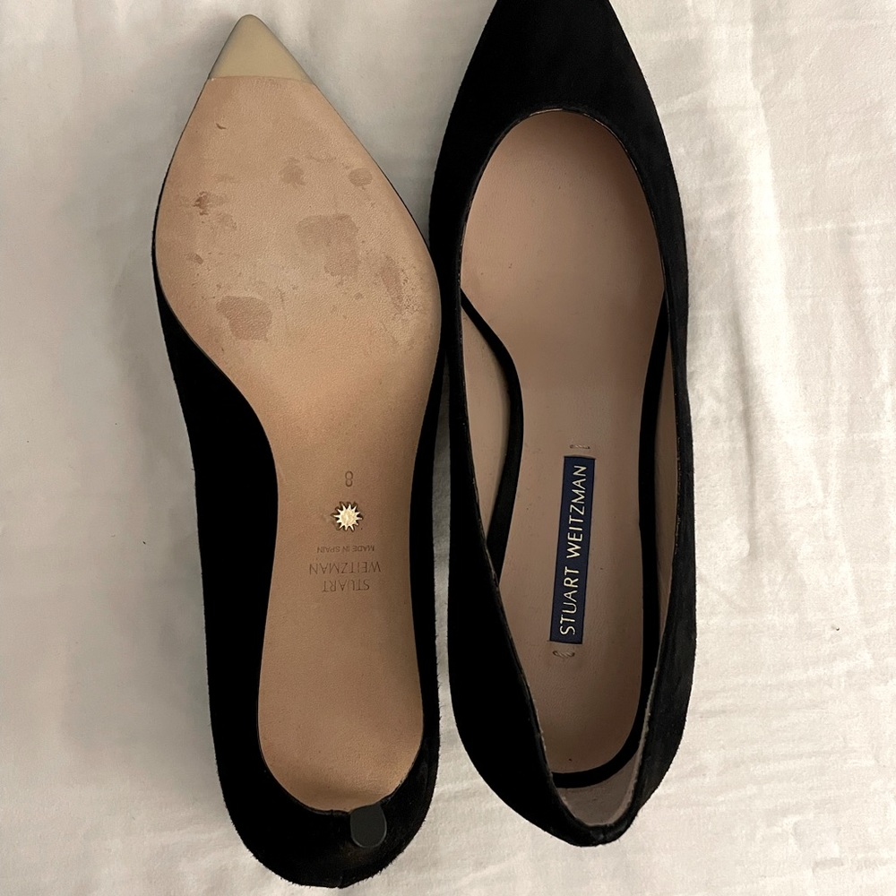 Brand new Stuart Weizmann black suede heels. Never worn.